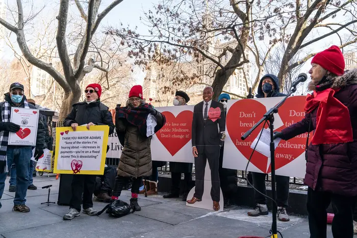 Municipal workers retirees protest proposed changes to medical benefits at City Hall park on Valentine's Day, Feb. 14, 2022.